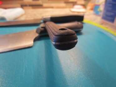 The Most Under-Appreciated Tool You Should Invest Money In, But Probably Haven't The warped diamond wood handle on the paring knife. Don't put wood in the dishwasher!