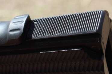 The mainspring housing is super flat, which has a distinct feel. 