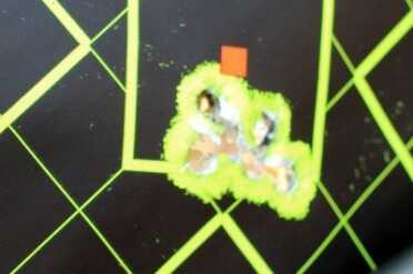 That's a full mag in one ugly hole from 25 yards. 