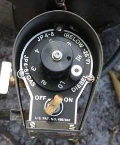 Prepping 101: Urban Survival Heater Stove Burns Oil/Gasoline 45k BTU This is the fuel regulator. You set the silver knob to the fuel type, and the dial then corresponds to the heat level.