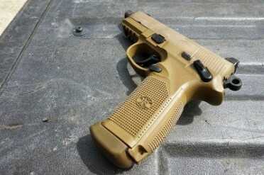 The 15 round mags have a fat pad on the bottom that helps protect them from rough mag drops.