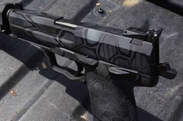 Custom Cerakote from Scalpel Arms Even though it looks like paint, it isn't.