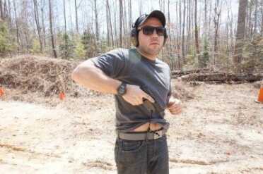 A short anchor is harder to work with, but ensures that the guard comes off quickly on the draw.