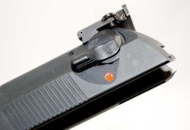 Review: Beretta 92 .22LR Practice Kit Conversion The safety / decocking lever works just like the original.