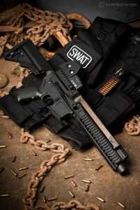 The AR57 upper receiver actually uses the top-mounted FN PS90 magazine and ejects through the lower receiver magazine well.