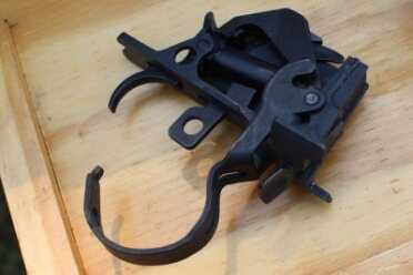 The trigger-pack is easy enough to remove, and very easy to service.