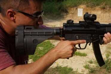 Cheek-weld with Sig brace. It is not a bad way to use it.