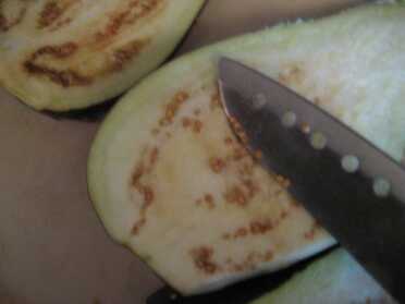 I have successfully saved and grown tomato and winter squash seeds from the supermarket, but from what I read it would be a dead end with eggplant, which requires that you leave the fruits on the vine after they would be picked for eating.  The same is true for green string beans, but dry beans in bags at the supermarket can generally be grown, as can whole feed corn. 