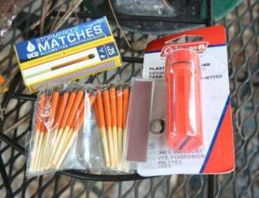 You can get both windproof matches and waterproof match cases at Walmart, or online, and they are cheap. This article is about using a sparker, and using the sun, but don't discount common sense supplies. 