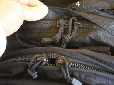 The street price of the Blackhawk pack is roughly three times the street price of the Chinese pack, but though they look similar and have similar storage capabilities, the Chinese pack, shown on top here,  has cheap zippers that will fail in a crisis. Hey, if it's all you can do, just be careful with the zippers, but if you are a high budget prepper, the Blackhawk pack is worth the investment. 