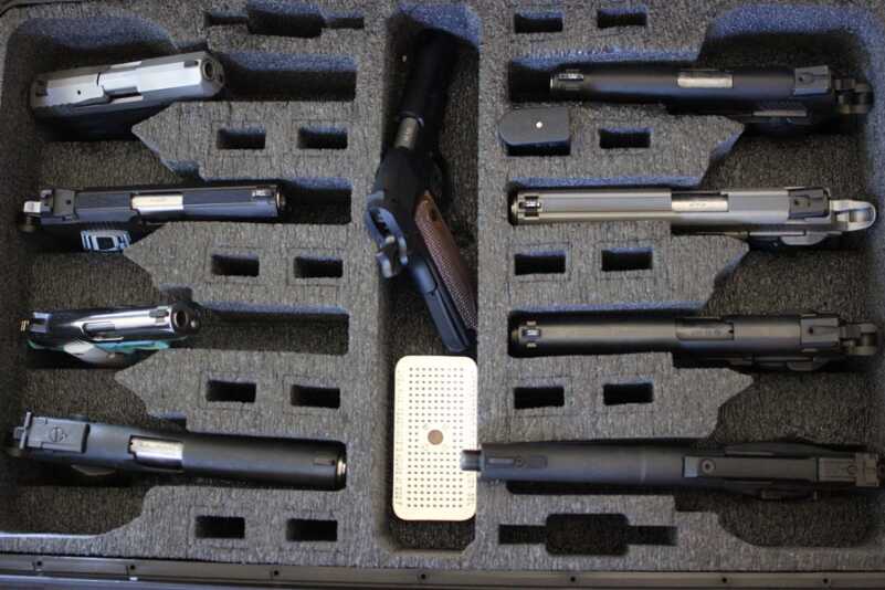 More than enough room for 8 guns, and mag cut outs for single-stack and double stack too (just pull out more foam).