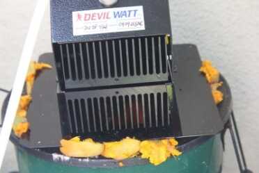 This may seem silly, but I try to solve problems with things I can find on the ground when I am working on survival stuff. I wanted to seal off the bottom plate of the 15 watt open flame Devil Watt so I used these fruits that fell from one of my trees. I don't know if you can eat them, but they make a great seal to get the power rocking along. 