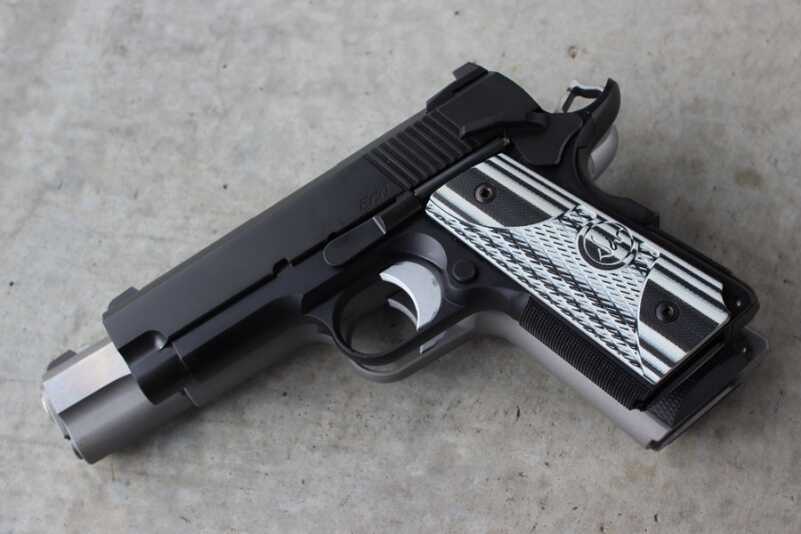 Dan Wesson ECO--The Perfect EDC 1911? The ECO on top of a full sized Dan Wesson.