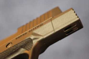 The bottom of the fist. It sticks out like the lip on a bulldog.