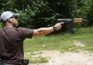 One handed works, but how long can you hold up a gun this heavy?