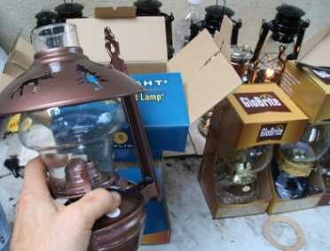 This lantern was on special at Amazon for $12, and it has a wall bracket. 