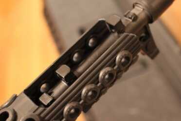 Troy Takes on the AK-47 There should be a plate to cover this open cut-out, which is required to get the tube over the sight.