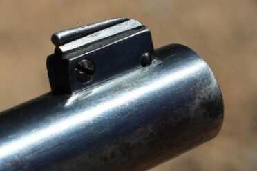 Shooting History: The Colt Woodsman Old school front adjustable sight.
