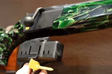 The fire control group houses the magazine, too. 