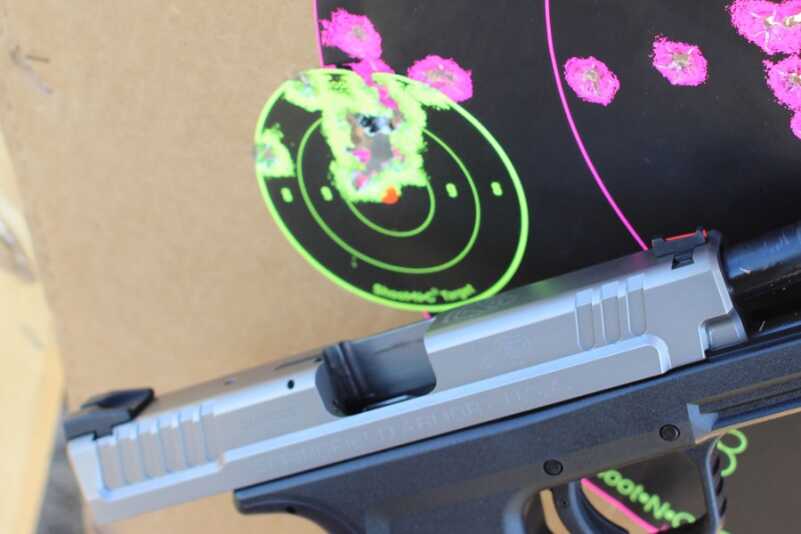 I'm spot-on with the Service model. That's 16 rounds in a 2" group from 15 yards.