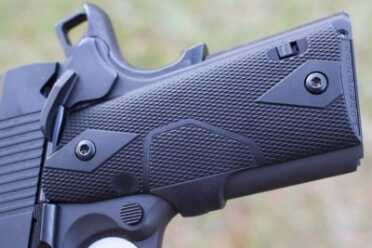 New Gun Review: Springfield 1911, Loaded Parkerized with Crimson Trace The Crimson Trace Grips offer a great... well grip.