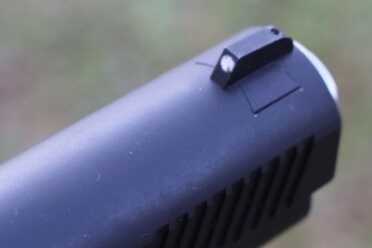 New Gun Review: Springfield 1911, Loaded Parkerized with Crimson Trace One dot on the front, there are two in the back.