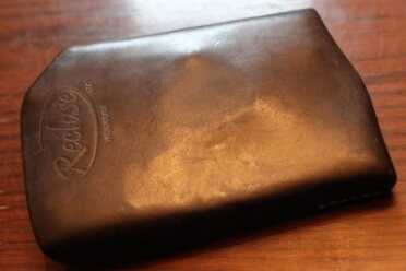 The clip pushes out the leather, just a bit. 