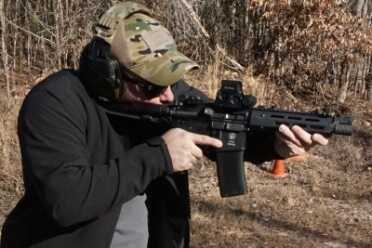 We Shoot the Troy P7A1 AR Pistol--SHOT Show 2016 The sling allows you to stabilize the gun effectively. Push out and it locks in place.