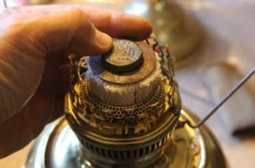 The burner and wick raiser are one piece, and make sure you have this flame spreader. 