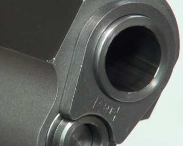 You'd better eat your spinach before you try to remove this barrel bushing. And you'll need a steel wrench!