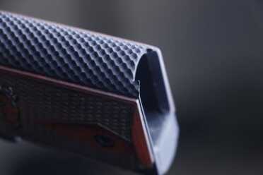 New Gun Review: EMP 4” Lightweight Champion The new Champion has dimples.