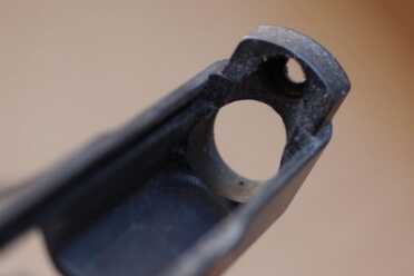 Keep the gunk out of this part of the slide, too, as the barrel needs clearance to travel freely. 