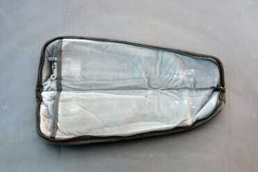 The case has sleeves to keep the gun from banging against itself.