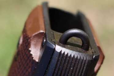 Lanyard loop and mag well. 