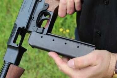 The Thompson M1927A1 from Auto Ordnance Slide the rib up the channel.