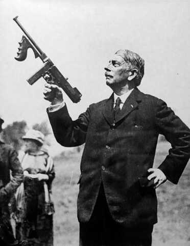 General Thompson and The Thompson Submachine Gun John Thompson holding a Thompson. I imagine he's saying something like, "Prithee, witness yon bird in the sky? I shall smite it, forthwith." That's how they talked back then.