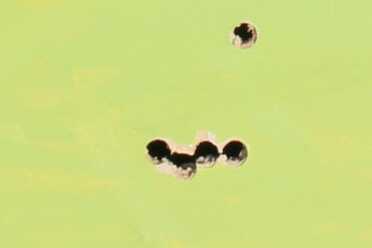 The Thompson M1927A1 from Auto Ordnance On the first day we were working with the Thompson, I fired this group from the bench--aimed at the top hole, from 100 yards.