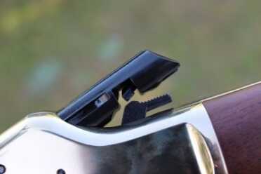 Bolt back, coking the hammer. 