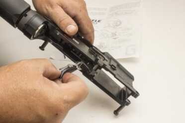 STEP 7: Apply a small amount of lubricant on the following locations: Each side of the disconnector, above the trigger pin, hammer and trigger sears, face of the disconnector, hammer tail where it contacts the disconnector, and the top of each side of the hammer spring where the spring contacts the receiver wall.