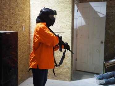 Pincus ran the students through a simulation where they used a Springfield Saint rifle with Force-on-Force training munitions loaded.