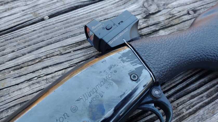 Burris SpeadBead mounted to shotgun laying on it's side. 