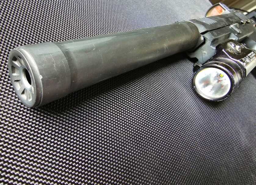 Top Accessories for the SIG Sauer P322 in 2023 SIG's SRD22X .22 Rimfire Suppressor shown mounted to the SIG P322.