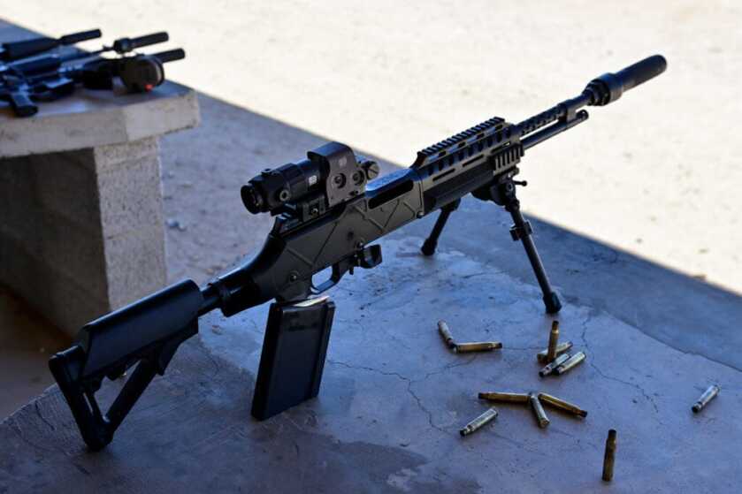 Ohio Ordinance Works modern BAR with Dead Air silencer at CANCON