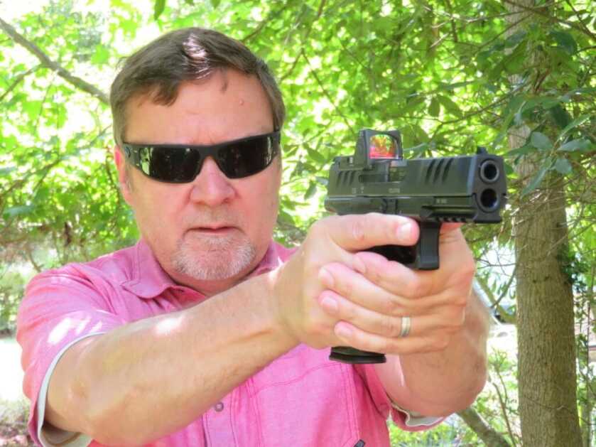 Aiming a Walther PDP 4.5" with Trijicon RMR Type 2 optic.