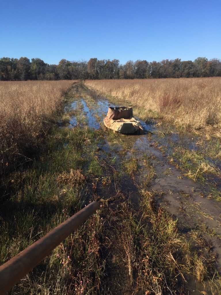 2 - Hunt365 - Carry or Haul Gear boat sitting on muddy ground