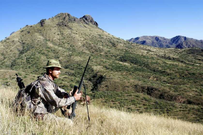 TAKE THE SHOT: Coues Deer At Last Light Hunter setting up for his shot in long brush