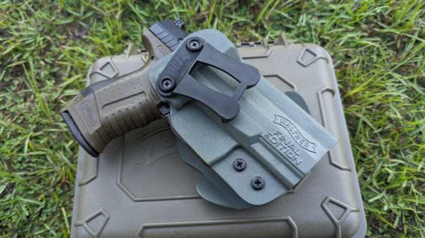 2 - The Walther P99 - Final Edition Holstered P99 on carry case resting in the grass