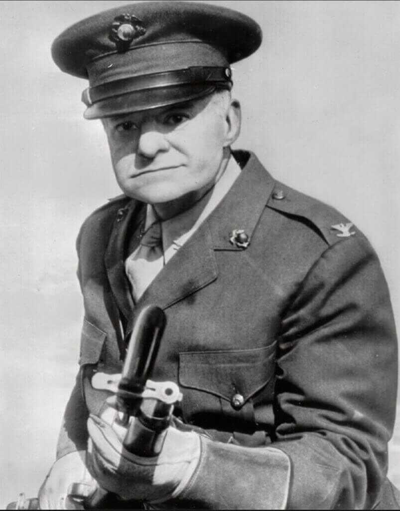 Joseph Drexel Biddle. in uniform holding a weapon
