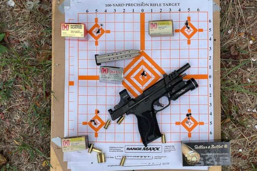 2 - S&W Performance Center 10mm M2.0 Pistol: Put to the Test 5-round groups shot from 10 yards. Top Left: Hornady 135gr MONOFLEX, Top Right: Hornady 155gr XTP, Middle: Hornady 175gr FlexLock, Bottom Left: Hornady 180gr XTP, Bottom Right: S&B 180gr FMJ