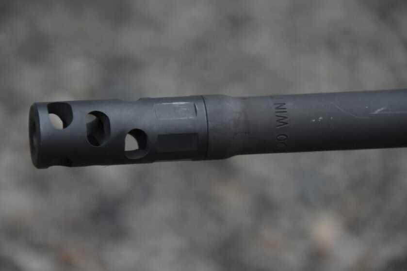 Closeup view of a muzzle brake.